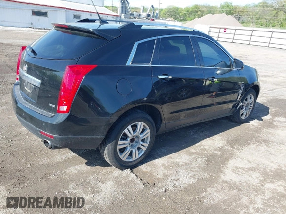 2012 Cadillac SRX Luxury Collection with VIN 3GYFNAE33CS659315, listed as a IAAI auction lot 42169849 with 164,018 mi miles and . Bid and sale history available at carsss.com. Image 4.