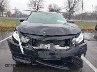 2018 Honda Civic LX with VIN 2HGFC2F54JH548274, listed as a IAAI auction lot 41864457 with 60,905 mi miles and . Bid and sale history available at DreamBid. Image 6.