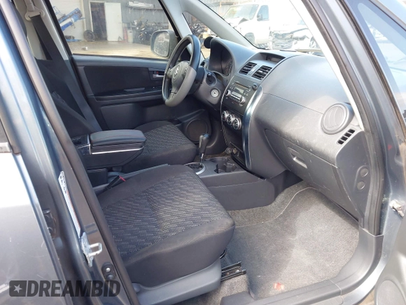 2008 Suzuki SX4 with VIN JS2YA415385100101, listed as a IAAI auction lot 41180693 with 121,081 mi miles and . Bid and sale history available at DreamBid. Image 5.