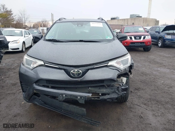 2018 Toyota RAV4 LE with VIN JTMBFREV0JJ223957, listed as a IAAI auction lot 41652810 with 144,629 mi miles. Bid and sale history available at carsss.com. Image 12.