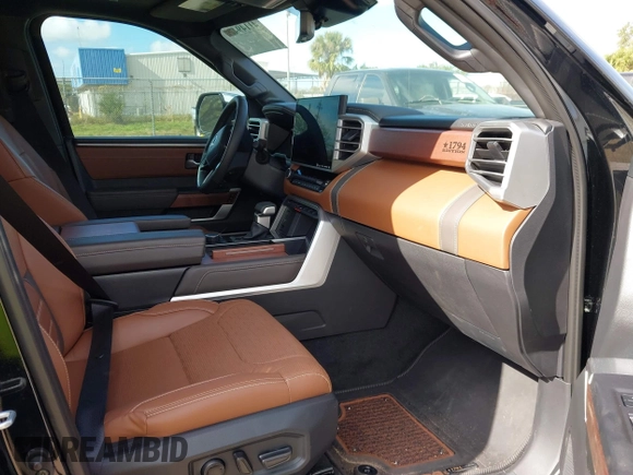 2024 Toyota Tundra 1794 Edition with VIN 5TFMA5DB2RX173868, listed as a IAAI auction lot 41149470 with 11,391 mi miles and . Bid and sale history available at DreamBid. Image 5.