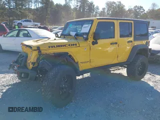 2015 Jeep Wrangler Unlimited Rubicon z VIN 1C4BJWFG4FL681946, wystawiony jako IAAI lot #40809597 z przebiegiem 57 148 mil mil oraz . Historia ofert i sprzedaży dostępna na DreamBid. Obrazek 14.