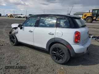 2015 MINI Countryman with VIN WMWZB3C50FWR44801, listed as a Copart auction lot 51957715 with 69,537 mi miles and Salvage Title. Bid and sale history available at DreamBid. Image 2.
