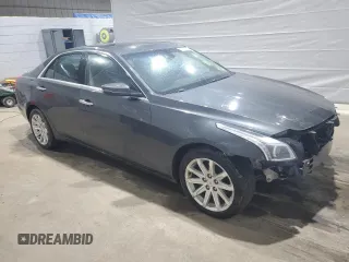 2014 Cadillac CTS Luxury AWD z VIN 1G6AX5SX5E0185132, wystawiony jako Copart lot #52292465 z przebiegiem 69 344 mil mil oraz Szkoda całkowita • Salvage title. Historia ofert i sprzedaży dostępna na DreamBid. Obrazek 4.