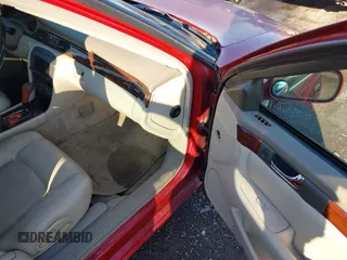 2003 Cadillac Seville Touring STS z VIN 1G6KY54983U212944, wystawiony jako IAAI lot #41656796 z przebiegiem 118 662 mil mil oraz . Historia ofert i sprzedaży dostępna na DreamBid. Obrazek 5.