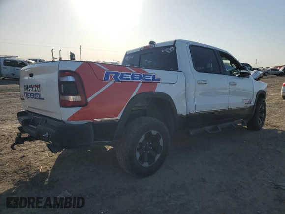 2019 Ram 1500 Rebel с VIN 1C6SRFLT7KN811895, выставлен на аукционе Copart как лот 52249485 с пробегом 162 597 миль миль и Списание • Salvage title. История ставок и продаж доступна на DreamBid. Изображение 3.