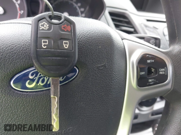 2018 Ford Fiesta SE with VIN 3FADP4BJXJM136232, listed as a IAAI auction lot 41901540 with 119,065 mi miles and . Bid and sale history available at DreamBid. Image 11.
