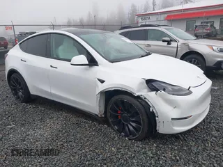 2023 Tesla Model Y Performance z VIN 7SAYGDEF2PF917295, wystawiony jako IAAI lot #41260852 z przebiegiem 23 295 mil mil oraz . Historia ofert i sprzedaży dostępna na DreamBid. Obrazek 1.