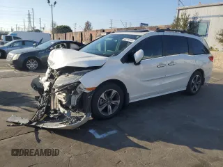 2018 Honda Odyssey Touring с VIN 5FNRL6H81JB002032, выставлен на аукционе Copart как лот 43219745 с пробегом Не указан миль и Списание • Salvage title. История ставок и продаж доступна на DreamBid. Изображение 1.