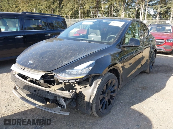 2021 Tesla Model Y Long Range with VIN 5YJYGDEE9MF301903, listed as a IAAI auction lot 42004007 with 26,740 mi miles. Bid and sale history available at carsss.com. Image 21.