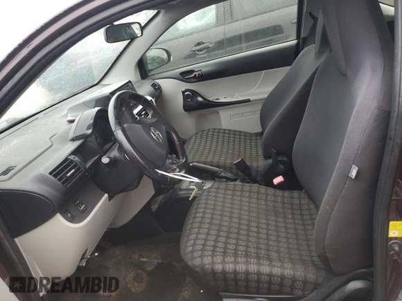 2013 Scion iQ with VIN JTNJJXB09DJ025885, listed as a Copart auction lot 45406845 with 63,679 mi miles and Salvage title. Bid and sale history available at DreamBid. Image 7.