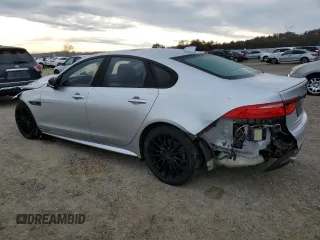 2016 Jaguar XF with VIN SAJBL4BV6GCY16964, listed as a Copart auction lot 82786584 with 100,587 mi miles and Salvage Title. Bid and sale history available at DreamBid. Image 2.