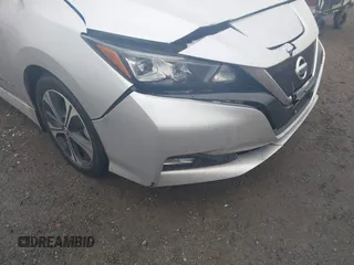 2019 Nissan LEAF SV z VIN 1N4AZ1CP2KC321523, wystawiony jako IAAI lot #41457178 z przebiegiem 28 146 mil mil oraz . Historia ofert i sprzedaży dostępna na DreamBid. Obrazek 6.