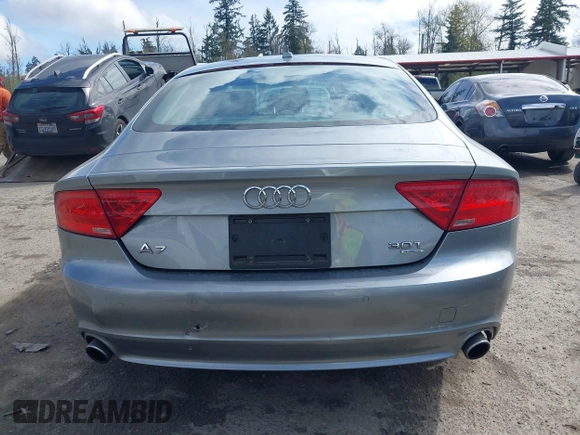 2014 Audi A7 Premium Plus z VIN WAUWGAFC4EN160144, wystawiony jako IAAI lot #41970181 z przebiegiem 118 761 mil mil oraz . Historia ofert i sprzedaży dostępna na DreamBid. Obrazek 16.