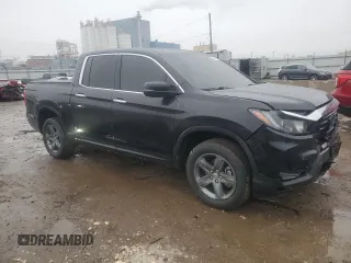 2021 Honda Ridgeline RTL-E с VIN 5FPYK3F70MB021965, выставлен на аукционе Copart как лот 43346265 с пробегом 71 686 миль миль и Списание • Salvage title. История ставок и продаж доступна на DreamBid. Изображение 4.