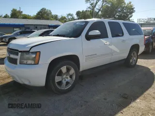 2009 Chevrolet Suburban LT w/2LT with VIN 1GNFC26J89R301726, listed as a Copart auction lot 73559004 with 188,380 mi miles and Salvage Title. Bid and sale history available at carsss.com. Image 1.
