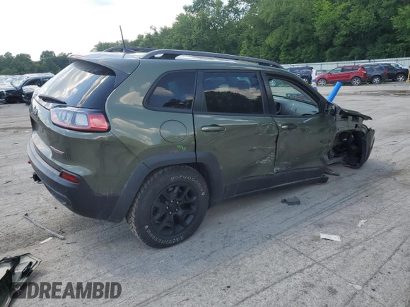 2021 Jeep Cherokee Trailhawk z VIN 1C4PJMBX0MD185078, wystawiony jako Copart lot #63264765 z przebiegiem 92 393 mil mil oraz Szkoda całkowita • Salvage title. Historia ofert i sprzedaży dostępna na DreamBid. Obrazek 3.