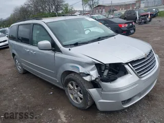 2008 Chrysler Town & Country Touring with VIN 2A8HR54P18R611579, listed as a IAAI auction lot 41909066 with 106,143 mi miles. Bid and sale history available at carsss.com. Image 1.