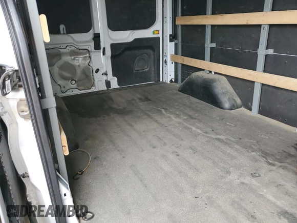 2021 Ford Transit Cargo с VIN 1FTBR1X87MKA53899, выставлен на аукционе Copart как лот 53969705 с пробегом 94 115 миль миль и Списание • Salvage title. История ставок и продаж доступна на DreamBid. Изображение 11.