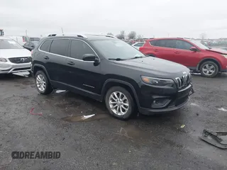2019 Jeep Cherokee Latitude with VIN 1C4PJLCB1KD339906, listed as a IAAI auction lot 41539248 with 123,243 mi miles and . Bid and sale history available at carsss.com. Image 1.