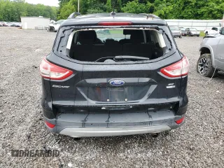 2014 Ford Escape SE with VIN 1FMCU9GX7EUB52765, listed as a Copart auction lot 57563305 with 187,203 mi miles and Salvage title. Bid and sale history available at DreamBid. Image 6.