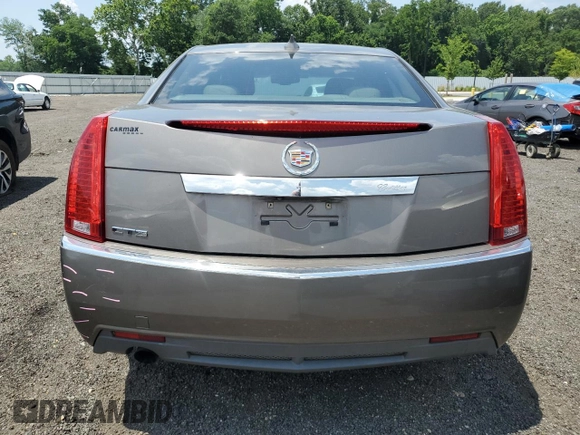 2012 Cadillac CTS Luxury with VIN 1G6DE5E54C0138040, listed as a Copart auction lot 61997305 with 140,996 mi miles and Salvage title. Bid and sale history available at DreamBid. Image 6.