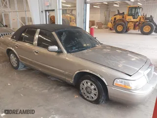 2005 Mercury Grand Marquis GS with VIN 2MEFM74W25X621219, listed as a IAAI auction lot 41552698 with 170,793 mi miles. Bid and sale history available at carsss.com. Image 1.