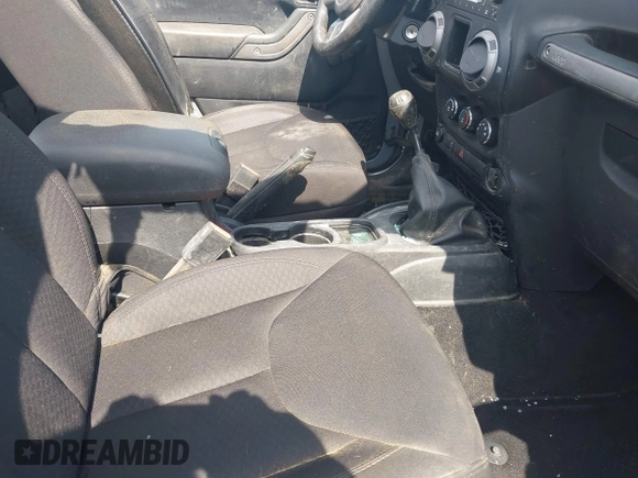 2014 Jeep Wrangler Sport with VIN 1C4AJWAG6EL192448, listed as a IAAI auction lot 42479738 with 44,848 mi miles and . Bid and sale history available at DreamBid. Image 5.
