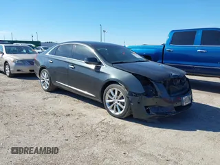 2014 Cadillac XTS Luxury with VIN 2G61M5S33E9213330, listed as a IAAI auction lot 38749333 with 145,948 mi miles and . Bid and sale history available at DreamBid. Image 1.