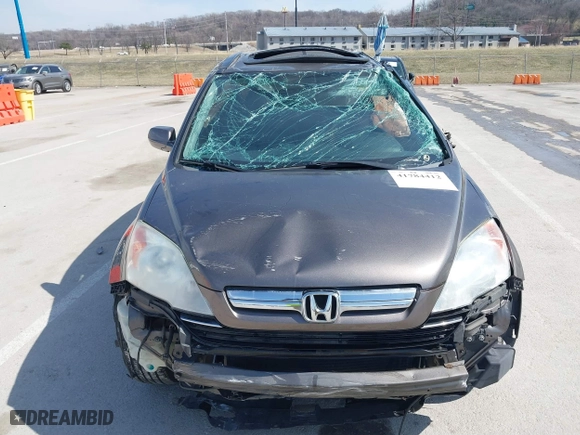 2009 Honda CR-V EX-L with VIN 5J6RE487X9L055661, listed as a IAAI auction lot 41784412 with 208,214 mi miles. Bid and sale history available at carsss.com. Image 6.