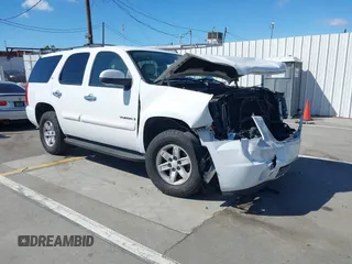 2007 GMC Yukon SLT with VIN 1GKFC13057R391885, listed as a IAAI auction lot 41792819 with 203,571 mi miles. Bid and sale history available at carsss.com. Image 1.