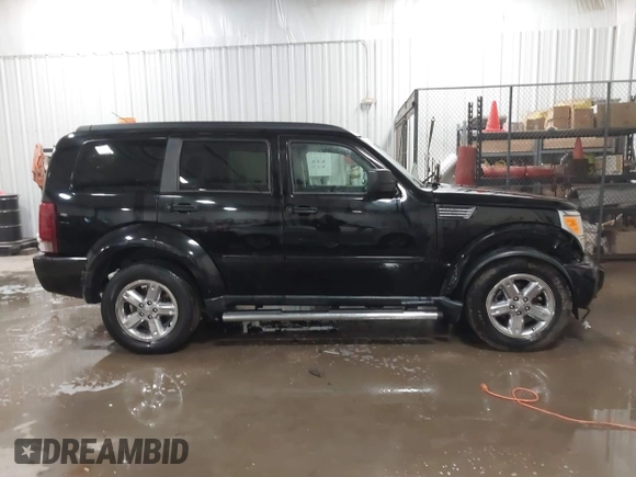 2007 Dodge Nitro SLT with VIN 1D8GT58K77W724530, listed as a IAAI auction lot 41499022 with 214,183 mi miles. Bid and sale history available at carsss.com. Image 13.