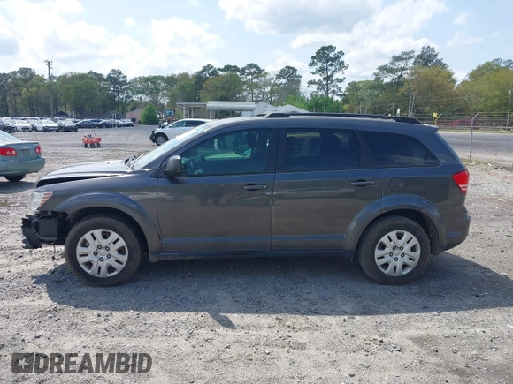 2017 Dodge Journey SE with VIN 3C4PDCABXHT538885, listed as a IAAI auction lot 41919599 with 170,311 mi miles and . Bid and sale history available at DreamBid. Image 14.