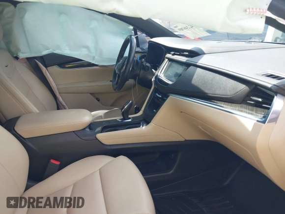 2018 Cadillac XT5 FWD with VIN 1GYKNARS2JZ232644, listed as a IAAI auction lot 42246009 with 93,855 mi miles and . Bid and sale history available at DreamBid. Image 5.