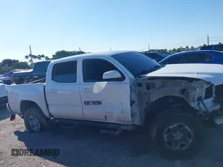 2023 Toyota Tacoma SR with VIN 3TMCZ5AN2PM649123, listed as a IAAI auction lot 41687819 with 44,383 mi miles and . Bid and sale history available at DreamBid. Image 12.