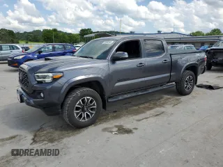 2021 Toyota Tacoma SR5 z VIN 3TYDZ5BN0MT002125, wystawiony jako Copart lot #56238385 z przebiegiem 58 237 mil mil oraz Szkoda całkowita • Salvage title. Historia ofert i sprzedaży dostępna na DreamBid. Obrazek 1.