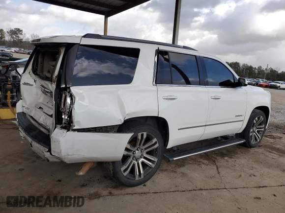 2017 GMC Yukon Denali with VIN 1GKS1CKJ1HR188049, listed as a Copart auction lot 89266975 with 140,516 mi miles and Salvage Title. Bid and sale history available at carsss.com. Image 3.