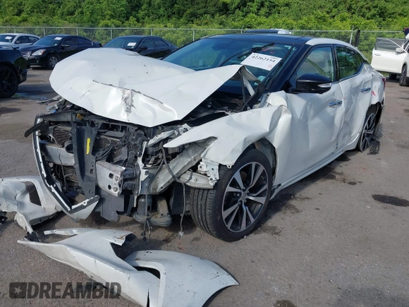 2018 Nissan Maxima SL with VIN 1N4AA6AP4JC366811, listed as a IAAI auction lot 42262154 with 179,731 mi miles and . Bid and sale history available at DreamBid. Image 2.