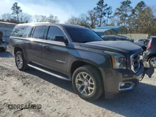2015 GMC Yukon XL SLT with VIN 1GKS1HKC3FR188825, listed as a Copart auction lot 88904935 with 201,178 mi miles and Salvage Title. Bid and sale history available at carsss.com. Image 4.