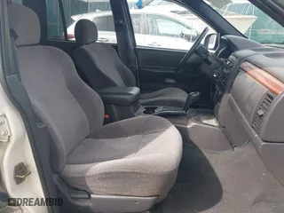 1999 Jeep Grand Cherokee Laredo with VIN 1J4GW58SXXC623404, listed as a IAAI auction lot 41838797 with 0 mi miles. Bid and sale history available at carsss.com. Image 5.