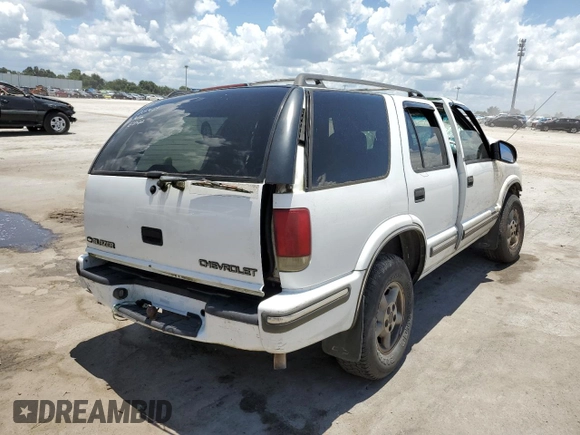 1999 Chevrolet Blazer Trailblazer z VIN 1GNDT13W6X2193629, wystawiony jako Copart lot #51184702 z przebiegiem Nie podano mil oraz Nie do naprawy • Non repairable. Historia ofert i sprzedaży dostępna na DreamBid. Obrazek 4.