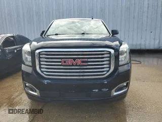 2017 GMC Yukon SLE with VIN 1GKS1AKC3HR307466, listed as a Copart auction lot 77559704 with 130,274 mi miles and Salvage Title. Bid and sale history available at carsss.com. Image 5.