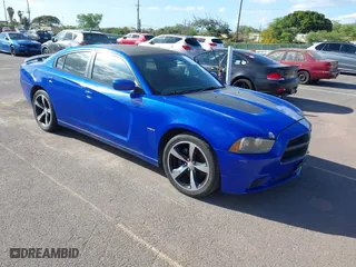 2013 Dodge Charger RT Max with VIN 2C3CDXCT6DH715161, listed as a IAAI auction lot 41722473 with 121,077 mi miles. Bid and sale history available at carsss.com. Image 1.