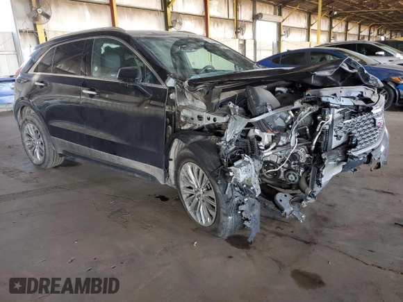 2024 Cadillac XT4 AWD Premium Luxury with VIN 1GYFZDR47RF153590, listed as a Copart auction lot 42846045 with 2,261 mi miles and Salvage title. Bid and sale history available at DreamBid. Image 4.