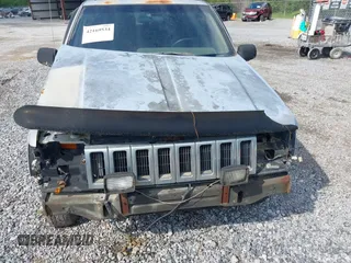 1995 Jeep Grand Cherokee Laredo with VIN 1J4GZ58S6SC756256, listed as a IAAI auction lot 42169534 with 255,516 mi miles. Bid and sale history available at carsss.com. Image 6.
