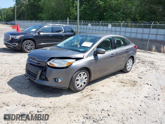 2012 Ford Focus SE with VIN 1FAHP3F22CL456552, listed as a IAAI auction lot 42341696 with 129,699 mi miles and . Bid and sale history available at DreamBid. Image 2.