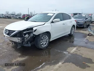 2016 Nissan Altima 2.5 S with VIN 1N4AL3AP6GN366587, listed as a IAAI auction lot 41836954 with 169,001 mi miles. Bid and sale history available at carsss.com. Image 2.