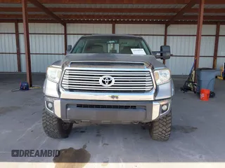 2015 Toyota Tundra Limited with VIN 5TFBW5F14FX424723, listed as a IAAI auction lot 42129929 with 222,060 mi miles and . Bid and sale history available at DreamBid. Image 12.