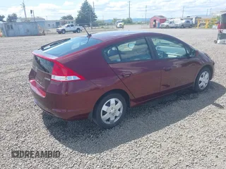 2011 Honda Insight LX z VIN JHMZE2H51BS004312, wystawiony jako IAAI lot #42086422 z przebiegiem 72 814 mil mil oraz . Historia ofert i sprzedaży dostępna na DreamBid. Obrazek 4.