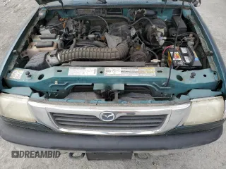 1999 Mazda B-Series Truck SE with VIN 4F4ZR17X5XTM25588, listed as a Copart auction lot 53667315 with 104,025 mi miles and Clean Title. Bid and sale history available at DreamBid. Image 11.